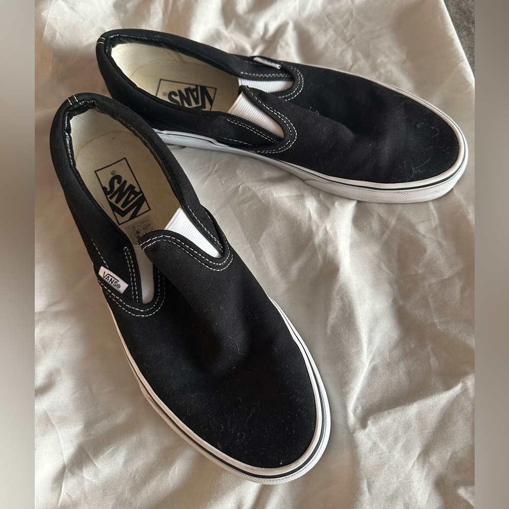 Vans classic black slip-ons